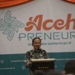 Staf Ahli Gubernur Aceh Bid. Perekonomian, Keuangan dan Pembangunan, Ir. Mawardi, melauncing Acehpreneur diHotel Hermes Banda Aceh, 20/7/2022
