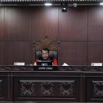Ketua Majelis Hakim Mahkamah Konstitusi (MK) Anwar Usman memimpin jalannya sidang putusan permohonan uji materi pasal dalam UU Nomor 7 tahun 2017 tentang Pemilu di Gedung Mahkamah Konstitusi (MK), Jakarta, Kamis (15/6/2023).[Foto/RM.ID]