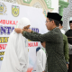 Foto/ Dok Humas DPRK Banda Aceh Foto bersama ketua DPRK Farid Nyak Umar memasang pita tanda peserta pada kegiatan Anak Cinta Masjid di Gampong Mulia, Banda Aceh