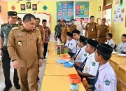 Pj Bupati Aceh Besar Luncurkan Program Makan Siang Gratis untuk Pelajar SMP