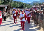 Antusiasme Warga Pakpak Bharat Warnai Kirab Api PON XXI Aceh