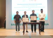 Pj Gubernur Tandatangani Kerja Sama Sponsorhip PON XXI dengan Dirut BSI