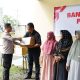 Polres Pidie Bagikan Sembako Untuk Warga Kurang Mampu