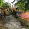 Polisi dan Pasukan Oranye Bersihkan Pinggiran Krueng Aceh dari Sampah