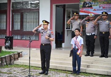 Kapolres Pidie Pimpin Upacara Program Polisi Peduli Pendidikan di SMPN 2 Sigli
